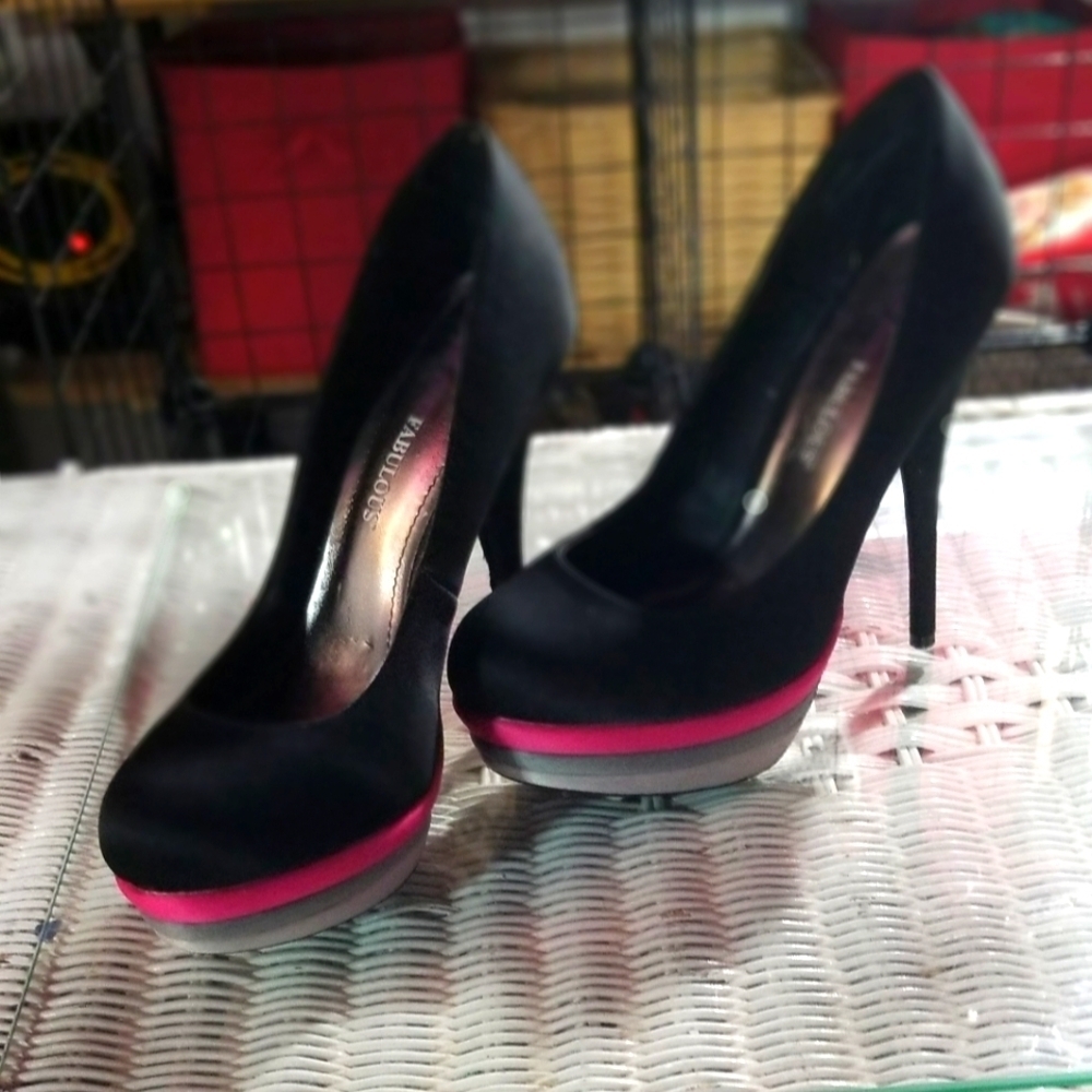 Just Fabulous  Black spike heels.